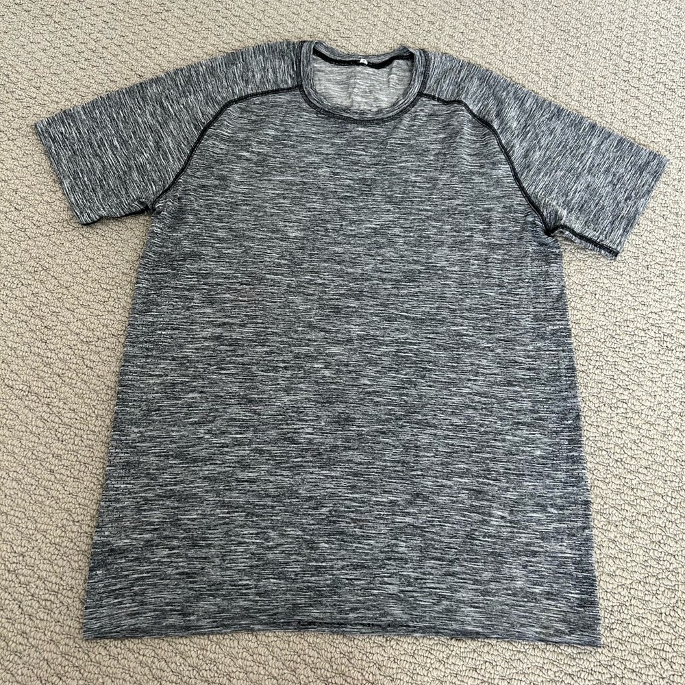 Lululemon Metal Vent Tech Surge Short Sleeve
Size Medium
Black White